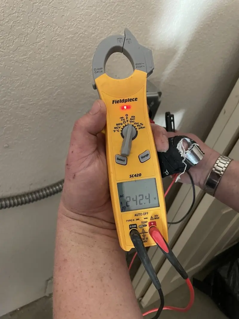 Voltage testing with clamp meter during Circuit Breaker Repair in South Bound Brook